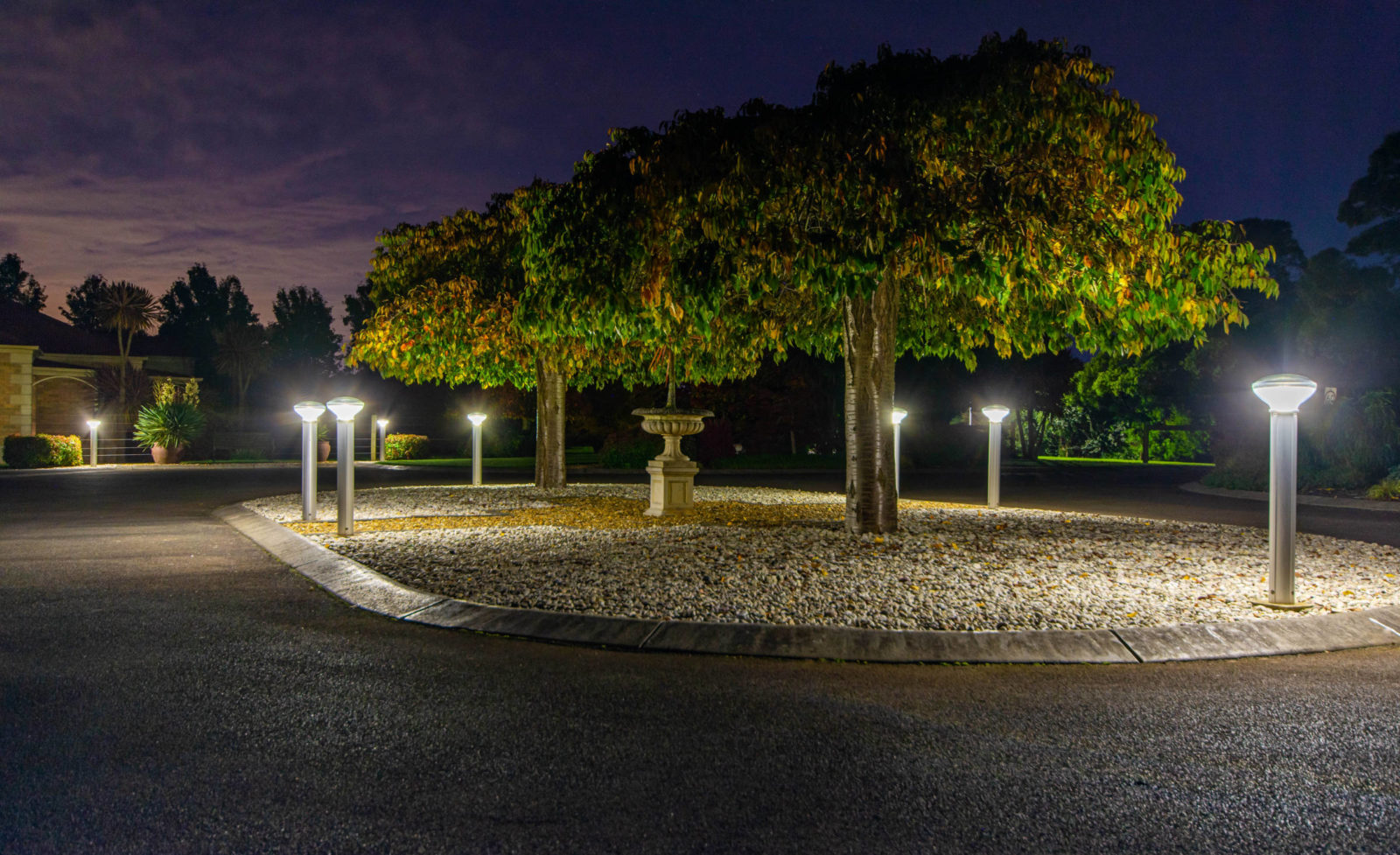 Solar Bollards lit up in a private turn-around driveway.